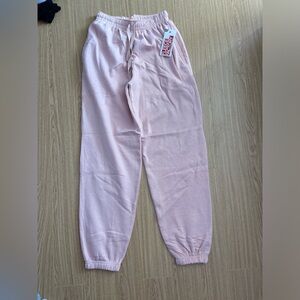 Pale pink/salmon sweatpants